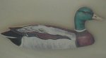 [A photo of a duck fridge magnet]